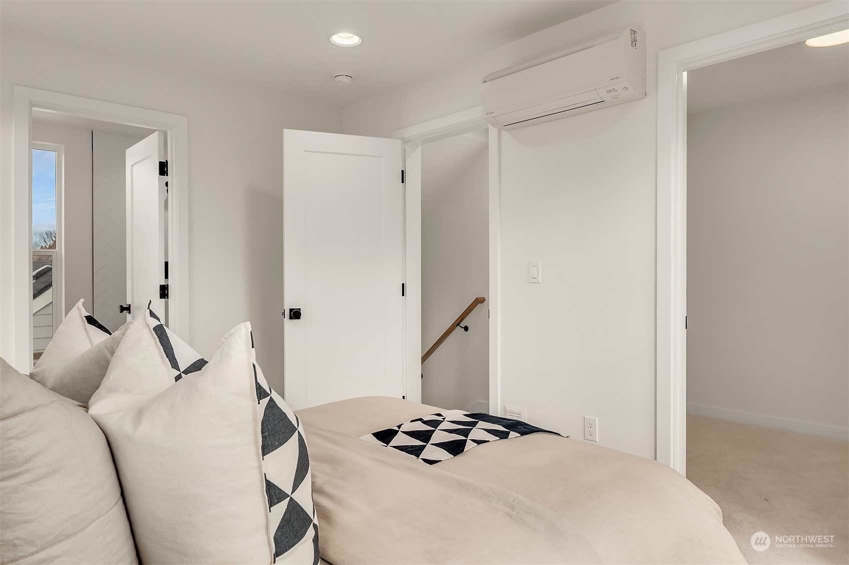 2216 Northeast 75th Street Seattle, WA 98115 - Photo 15 of 23 a bedroom with a bed and a table