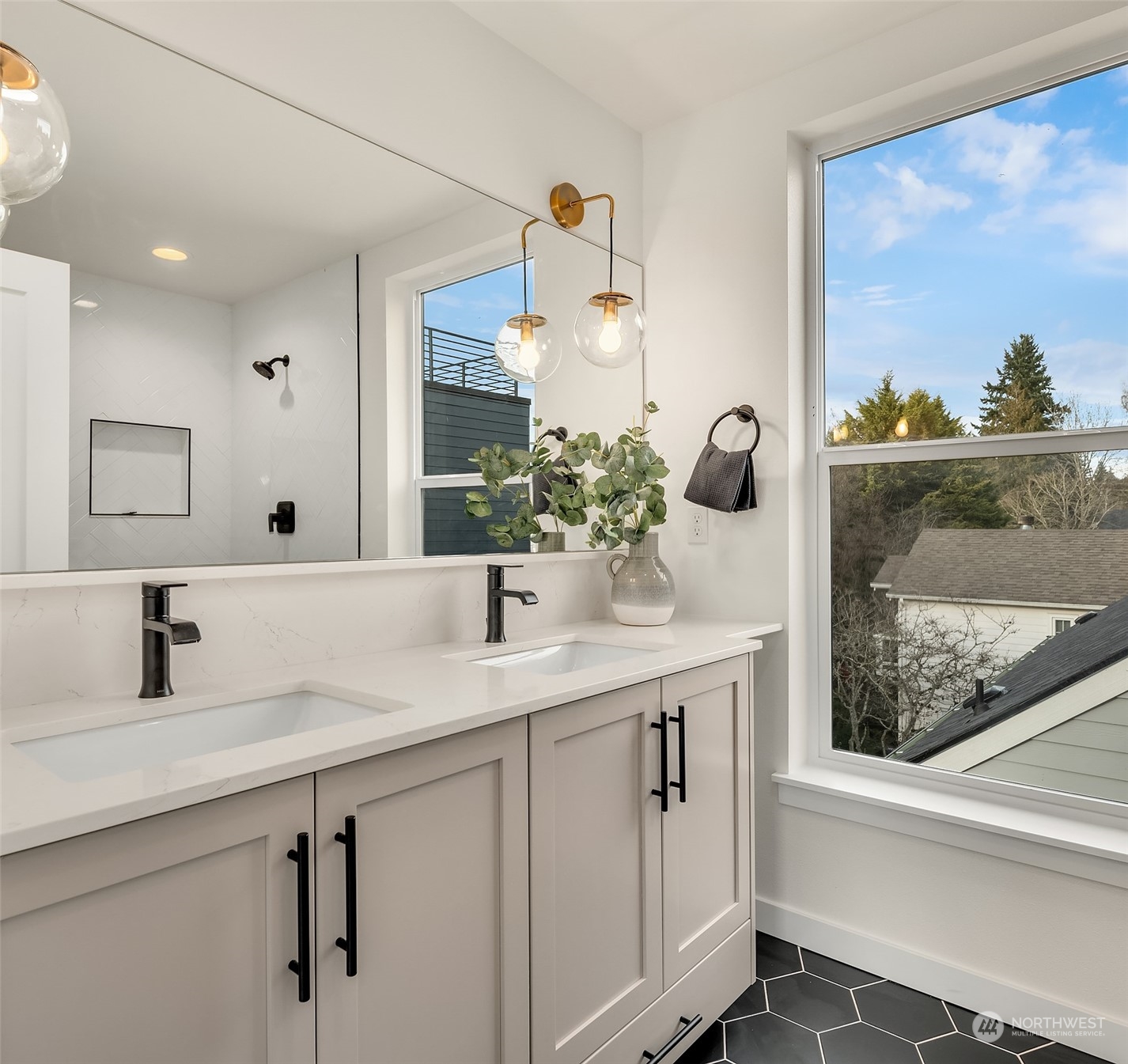 2216 Northeast 75th Street Seattle, WA 98115 - Photo 16 of 23 a bathroom with a sink and a mirror