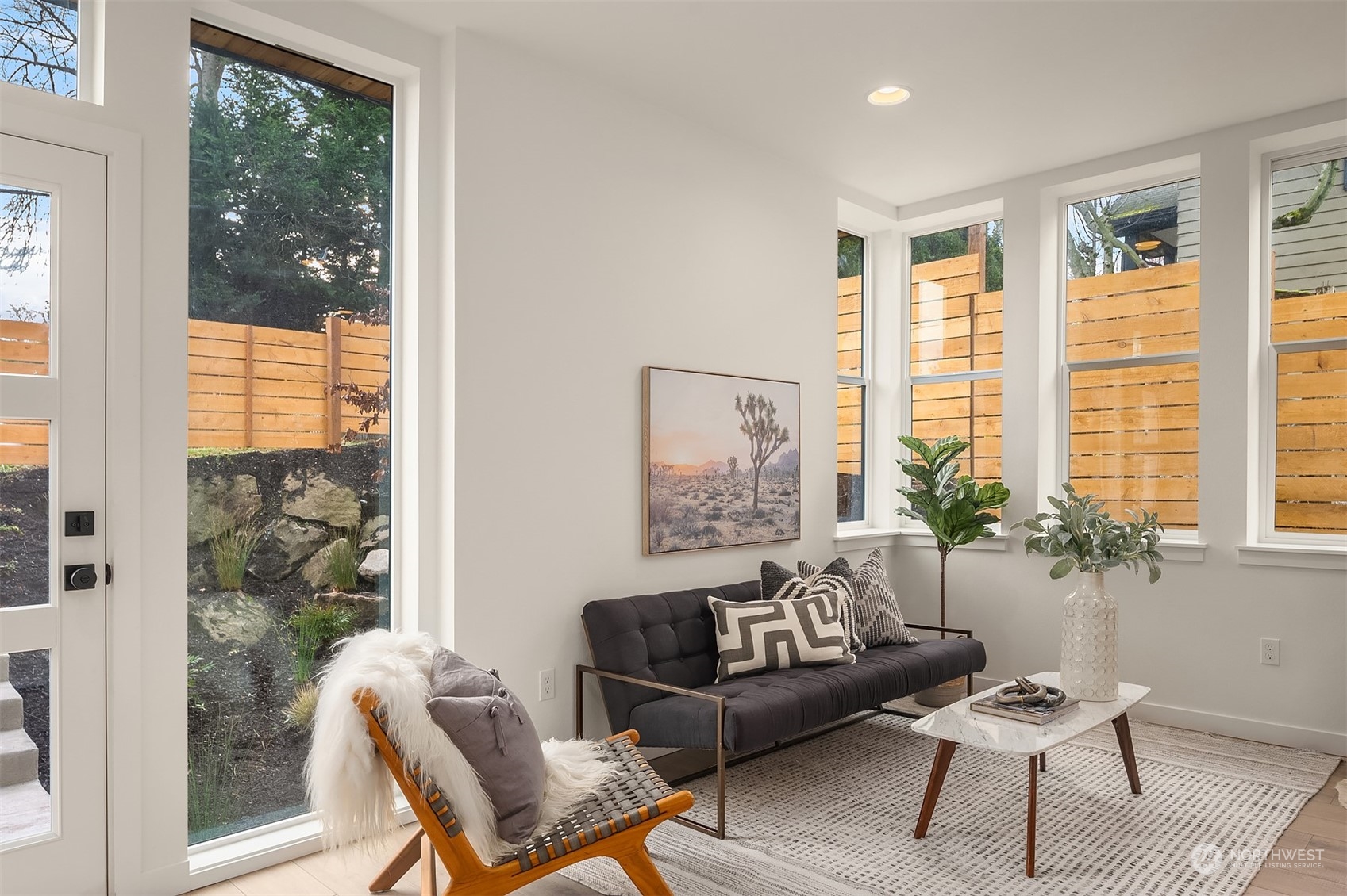 2216 Northeast 75th Street Seattle, WA 98115 - Photo 3 of 23 a living room with furniture and a window