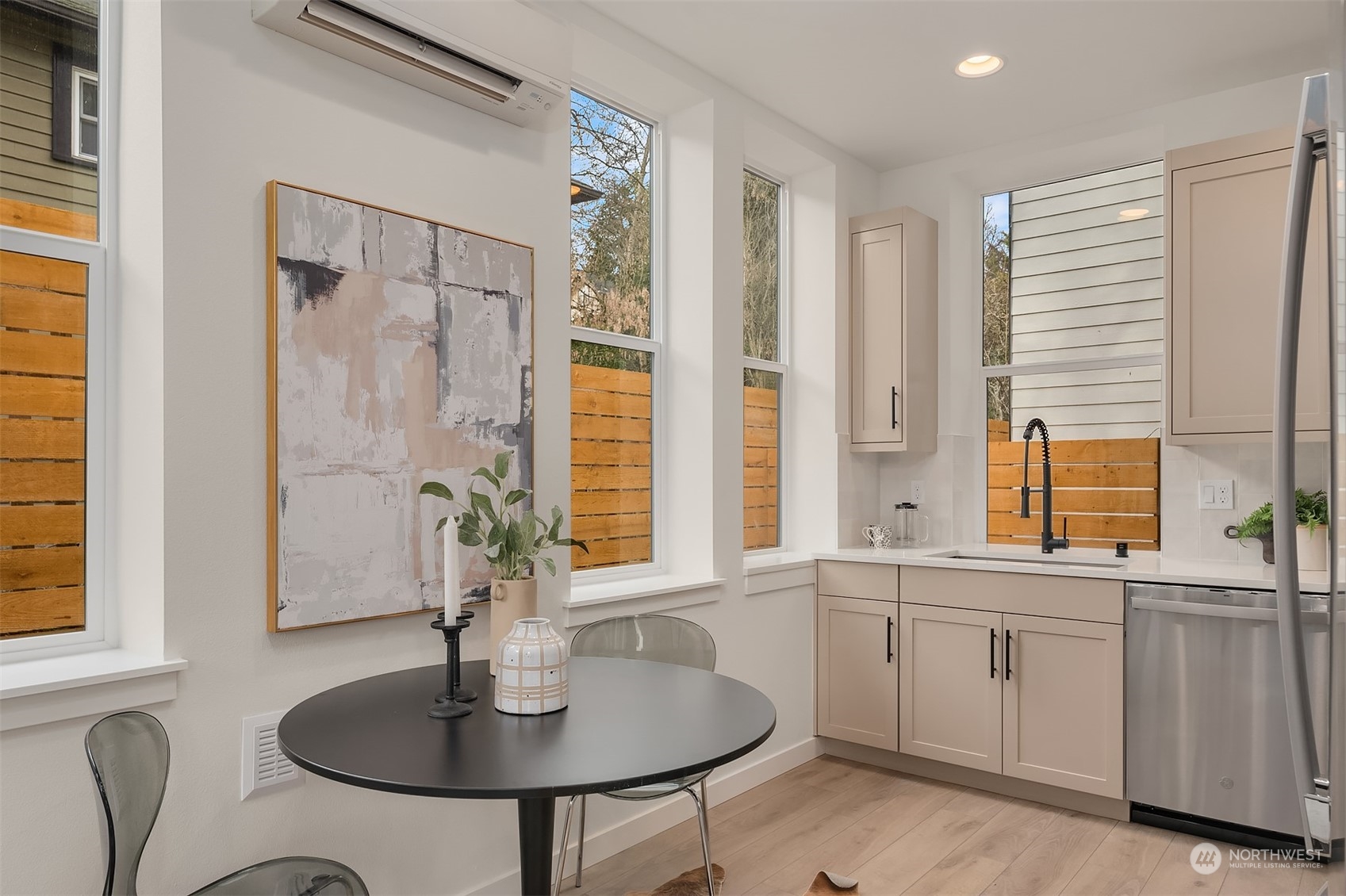 2216 Northeast 75th Street Seattle, WA 98115 - Photo 8 of 23 a kitchen with a sink and chandelier