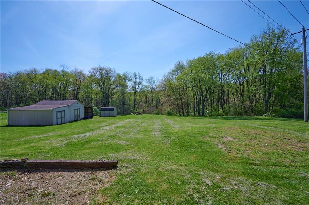 365 West Park Road Portersville, PA 16051 - Photo 36 of 38 Back yard with sheds for storage