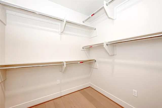 a view of a room with racks on the wall