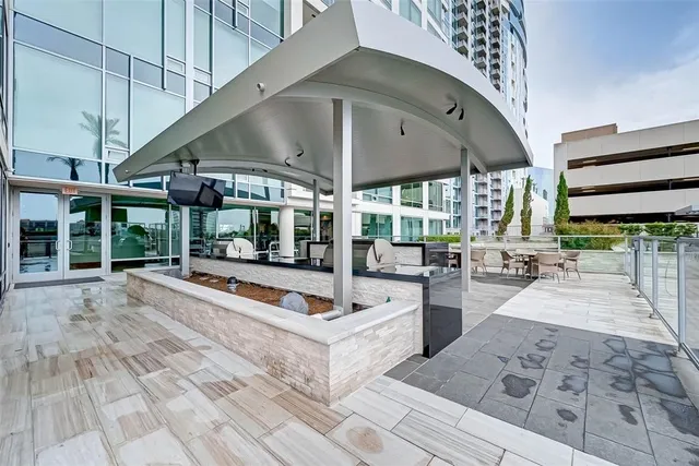 a outdoor space with lots of white furniture