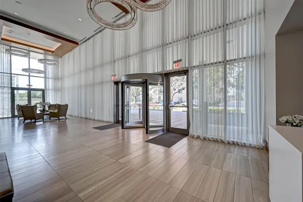 a view of an entrance with two large window