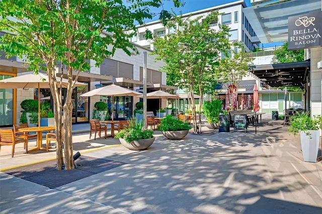a outdoor space with the couches and a fireplace