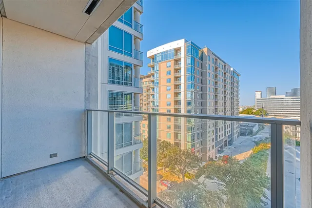 a view of balcony with floor to ceiling window and stairs