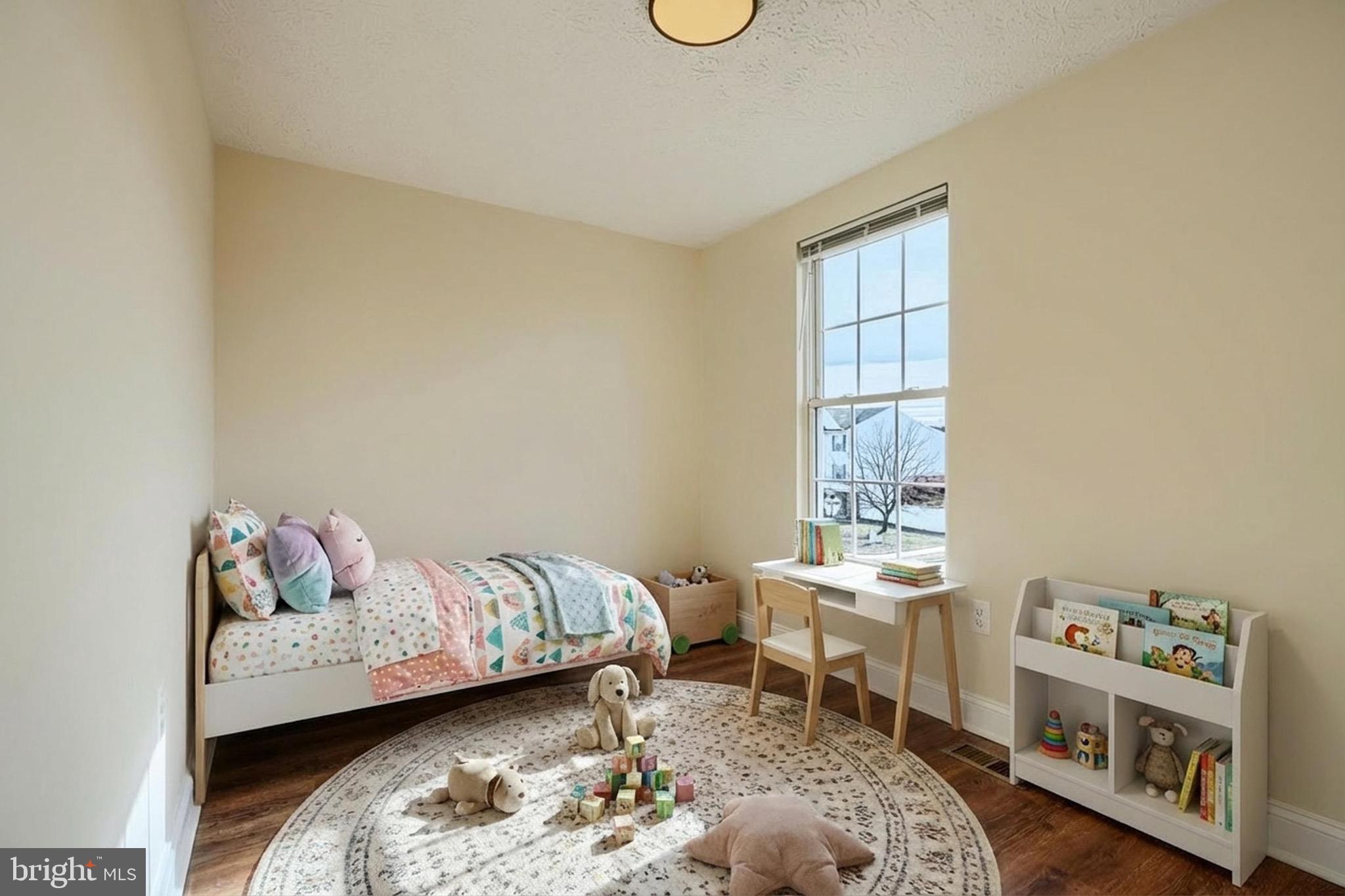 3944 Cutty Sark Road Baltimore, MD 21220 - Photo 13 of 27 a bedroom with a bed and a window