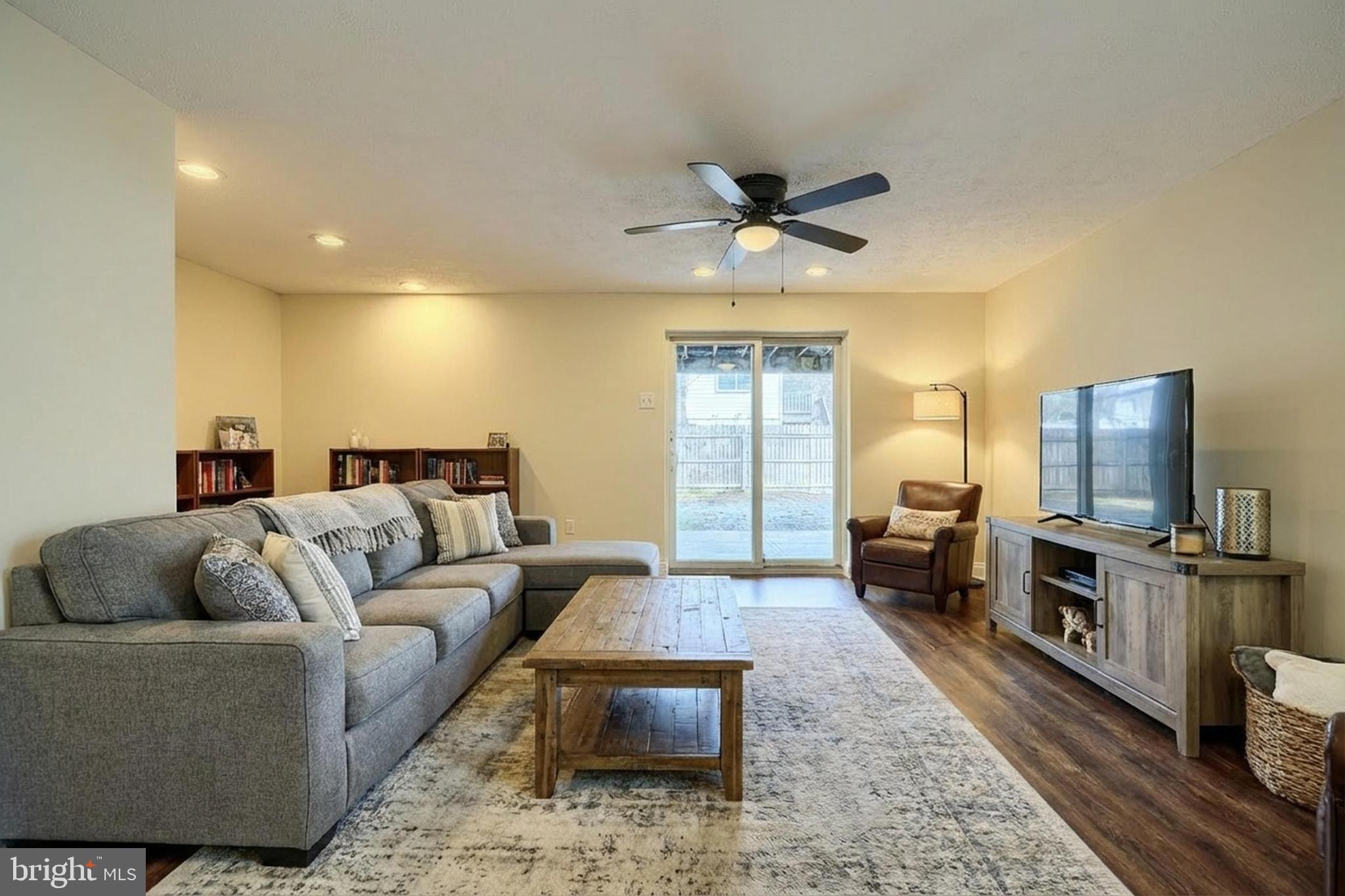 3944 Cutty Sark Road Baltimore, MD 21220 - Photo 20 of 27 a living room with furniture and a flat screen tv