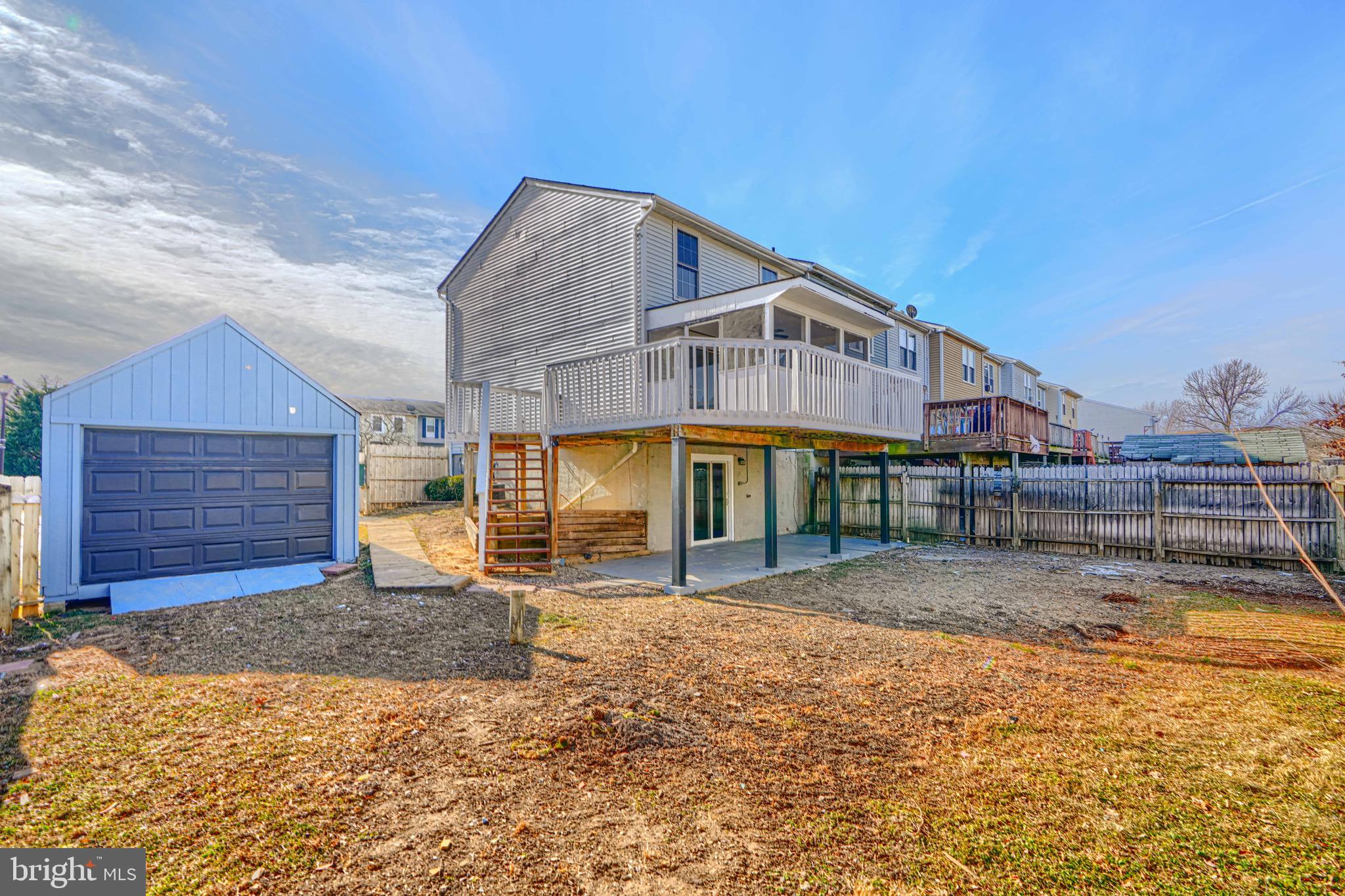 3944 Cutty Sark Road Baltimore, MD 21220 - Photo 25 of 27 a front view of a house with a yard