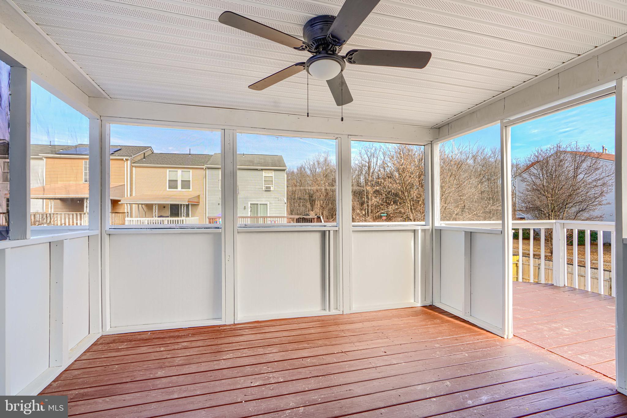 3944 Cutty Sark Road Baltimore, MD 21220 - Photo 8 of 27 a view of empty room with wooden floor and fan