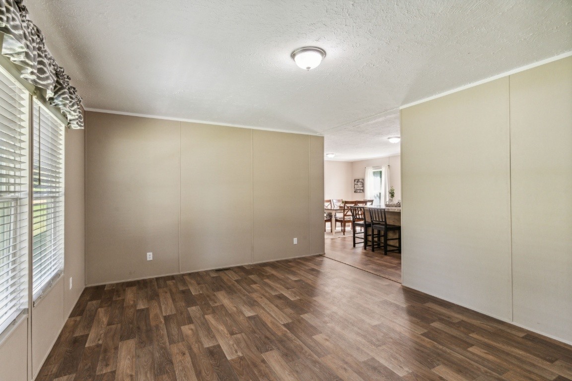 235 Antioch Road Lafayette, TN 37083 - Photo 11 of 17 a view of empty room with wooden floor