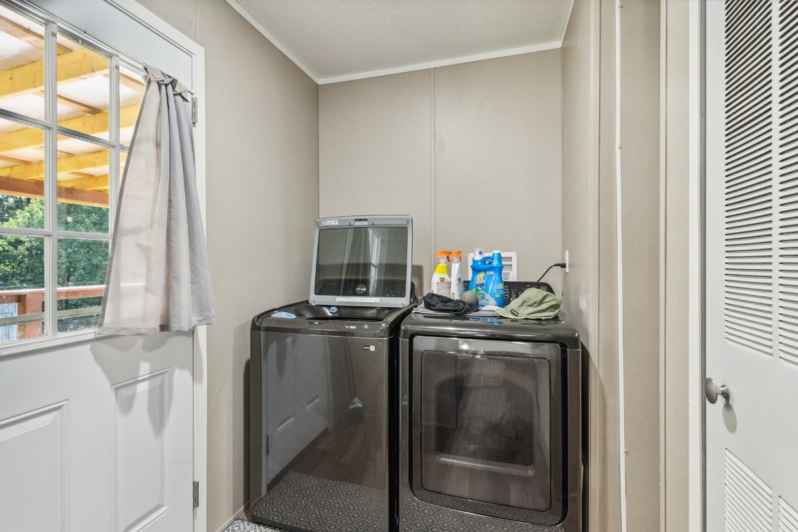 235 Antioch Road Lafayette, TN 37083 - Photo 13 of 17 a kitchen with a stove and a refrigerator