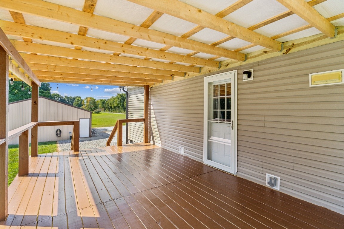 235 Antioch Road Lafayette, TN 37083 - Photo 5 of 17 a view of a patio with wooden floor