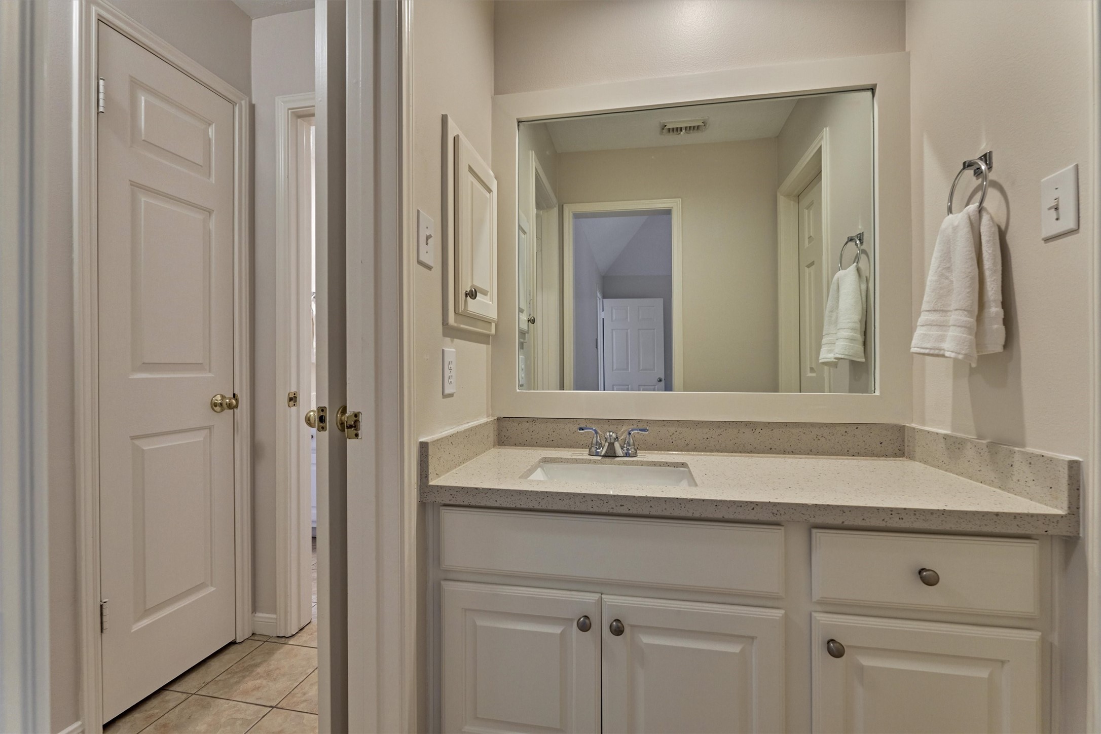 16707 Avenfield Road Tomball, TX 77377 - Photo 30 of 50 a bathroom with a sink and a mirror