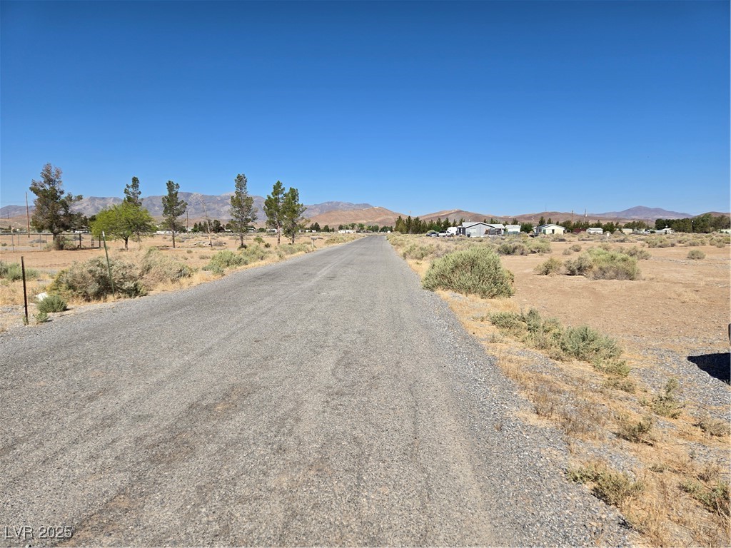 4360 Emma Street Pahrump, NV 89048 - Photo 3 of 3 View of asphalt street with a mountain view