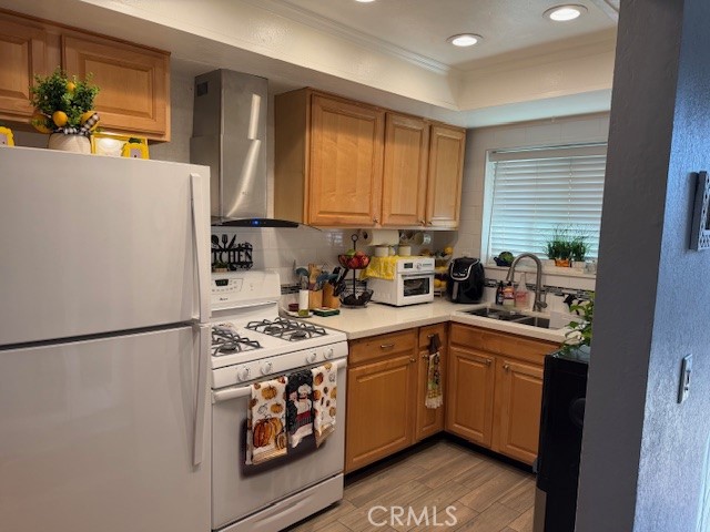 708 West Lambert Road, Unit 6 La Habra, CA 90631 - Photo 6 of 13 a kitchen with stainless steel appliances granite countertop a sink stove and refrigerator