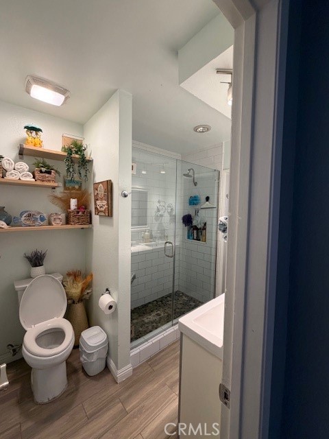 708 West Lambert Road, Unit 6 La Habra, CA 90631 - Photo 8 of 13 a bathroom with a toilet and a shower