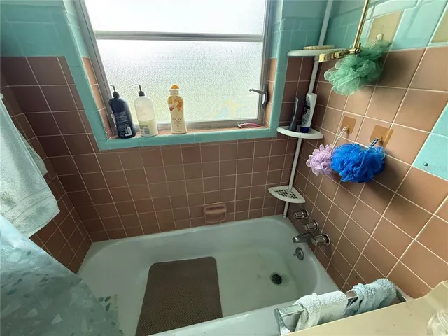 a view of swimming pool with a backyard