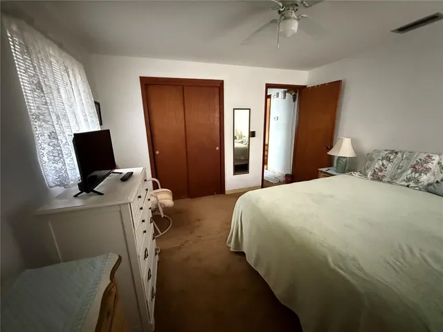 a view of a backyard of the house