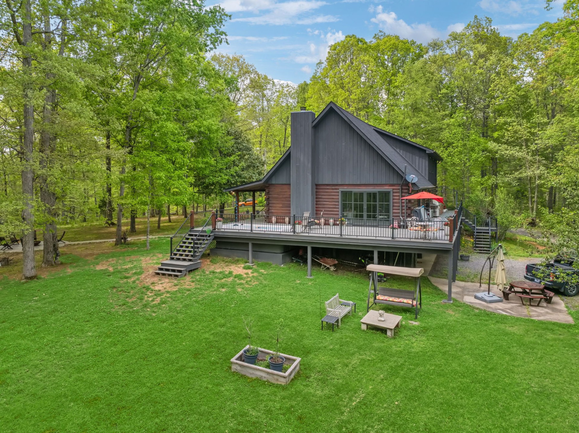5617 A Pinewood Road Franklin, TN 37064 - Photo 61 of 67 a view of backyard with a table and chairs