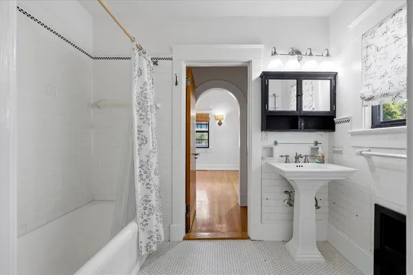 a utility room with sink dryer and washer
