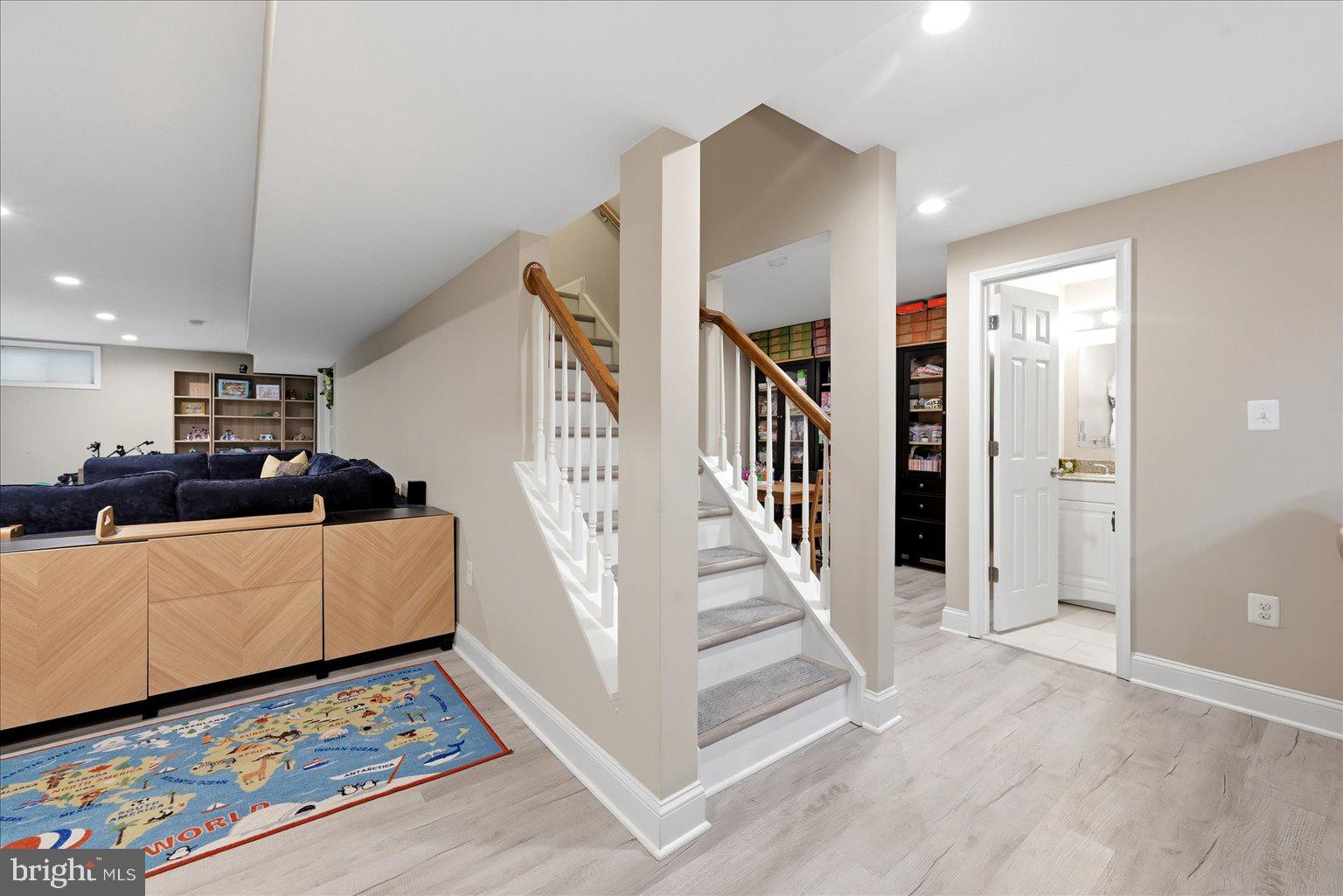 911 Riva Ridge Drive Great Falls, VA 22066 - Photo 25 of 55 Inviting entryway with stylish staircase.