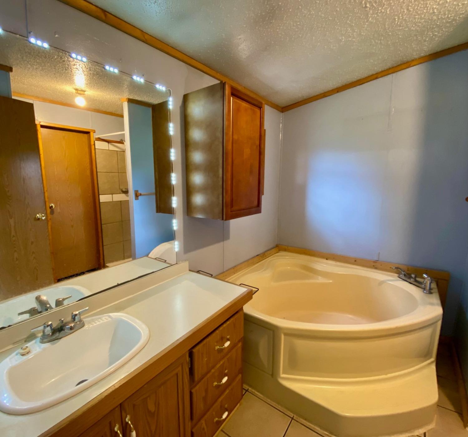15074 Franklin Road Brookville, IN 47012 - Photo 14 of 49 Master bathroom offering a garden tub.