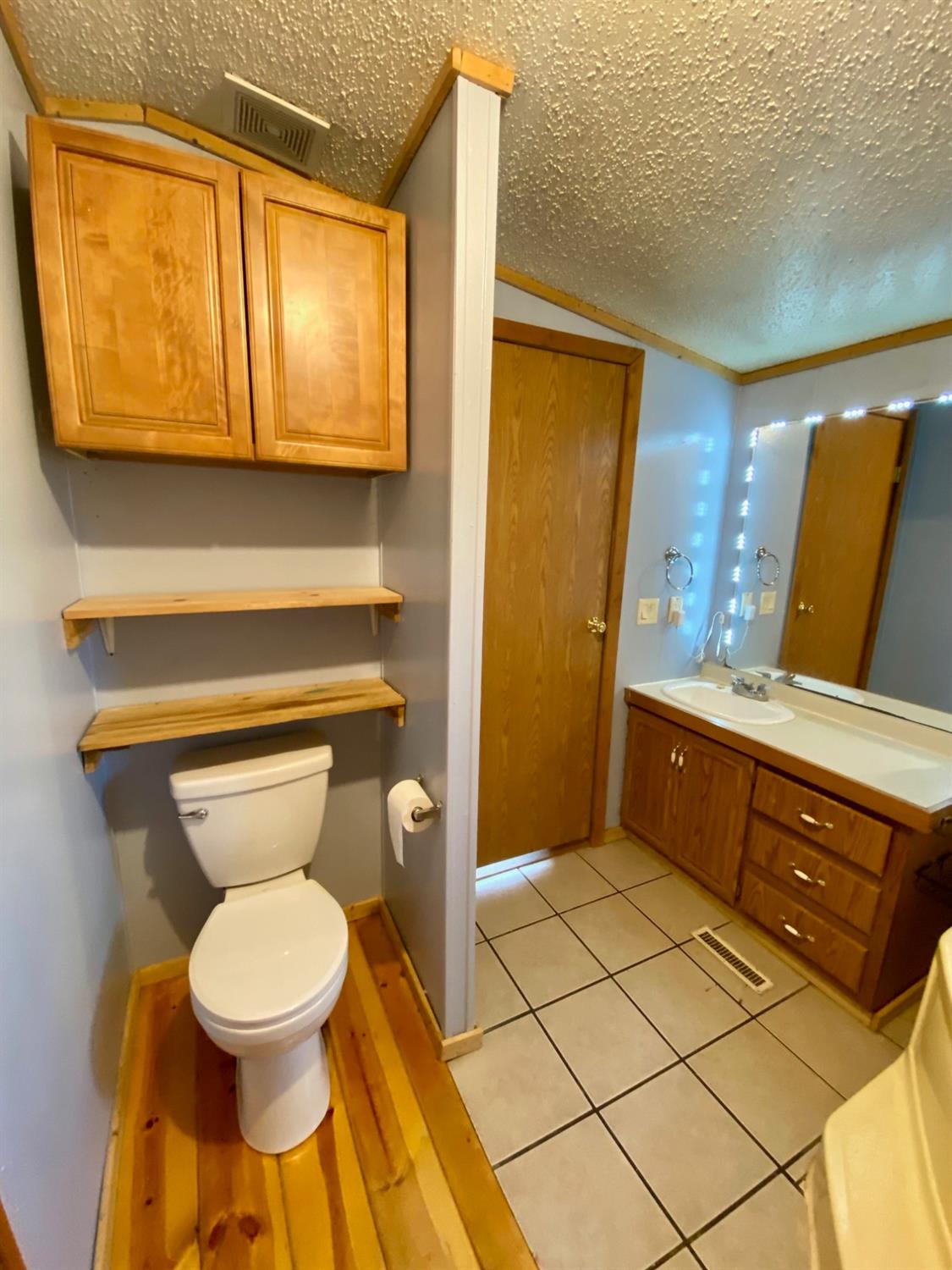 15074 Franklin Road Brookville, IN 47012 - Photo 15 of 49 Master bathroom offers several storage areas.