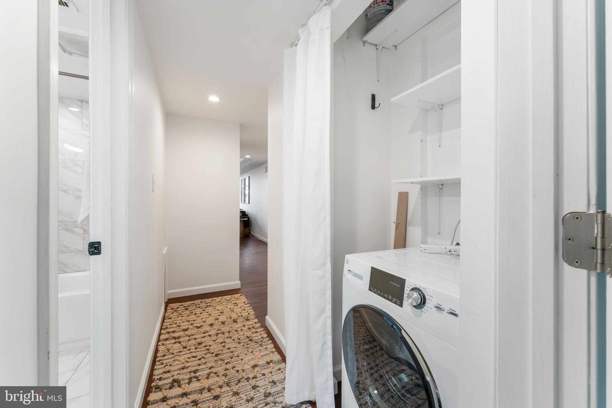 1700 17th Street Northwest, Unit 508 Washington, DC 20009 - Photo 14 of 24 a view of bathroom with washer and dryer