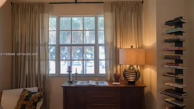 a view of a dining room with furniture window and outside view