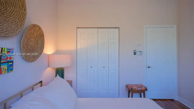 a view of staircase with wooden floor