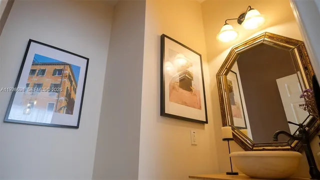 a bathroom with a shower curtain