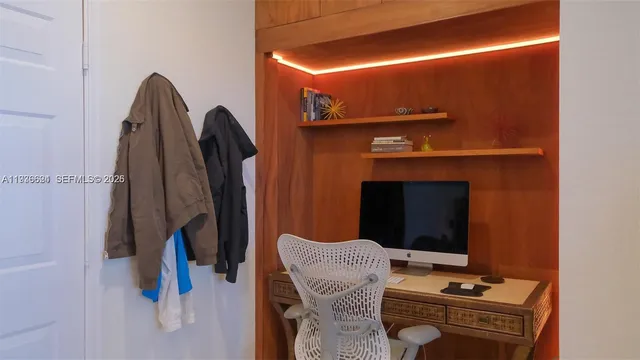 a room with furniture and a window