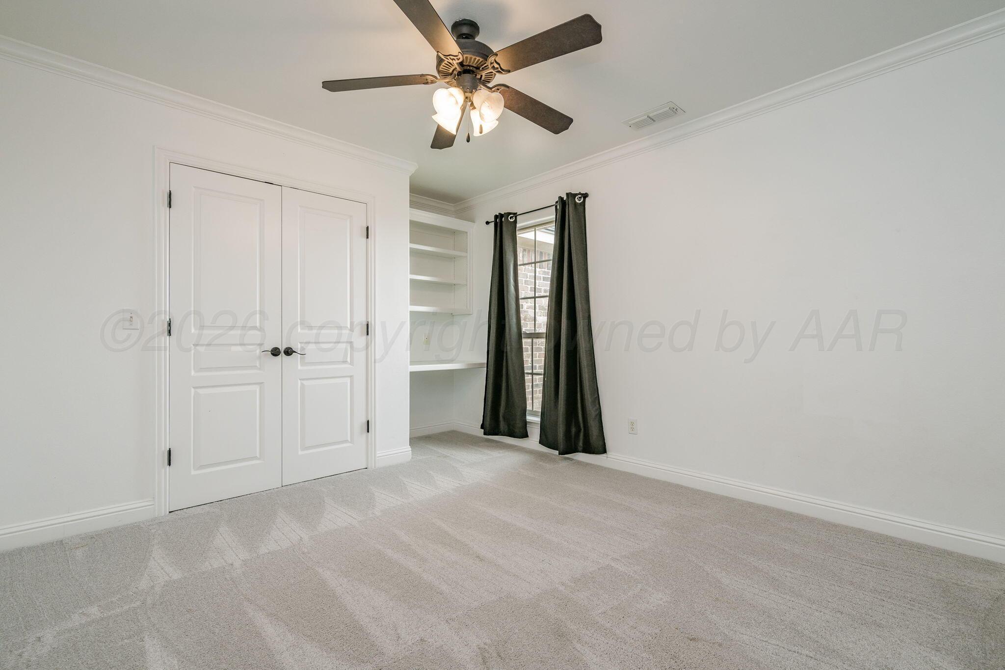 16700 Dove Meadow Road Canyon, TX 79015 - Photo 12 of 24 wooden floor in an empty room