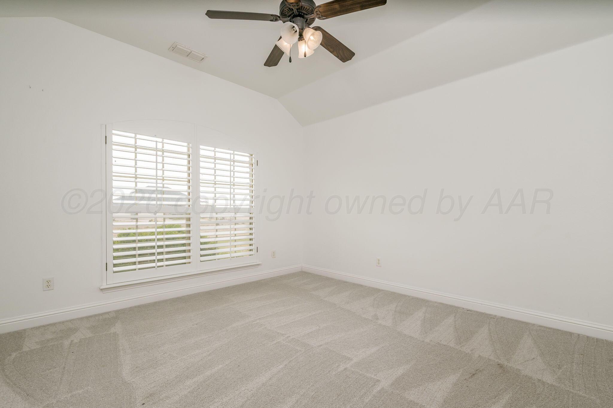 16700 Dove Meadow Road Canyon, TX 79015 - Photo 15 of 24 a view of an empty room with a window