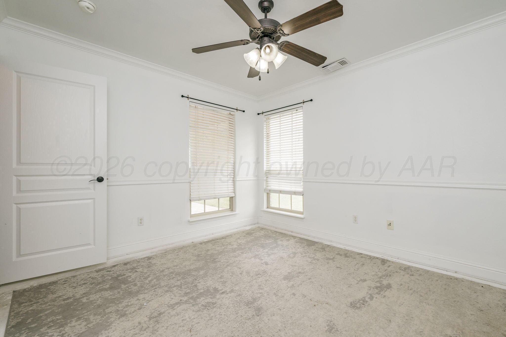 16700 Dove Meadow Road Canyon, TX 79015 - Photo 16 of 24 a view of an empty room with a window