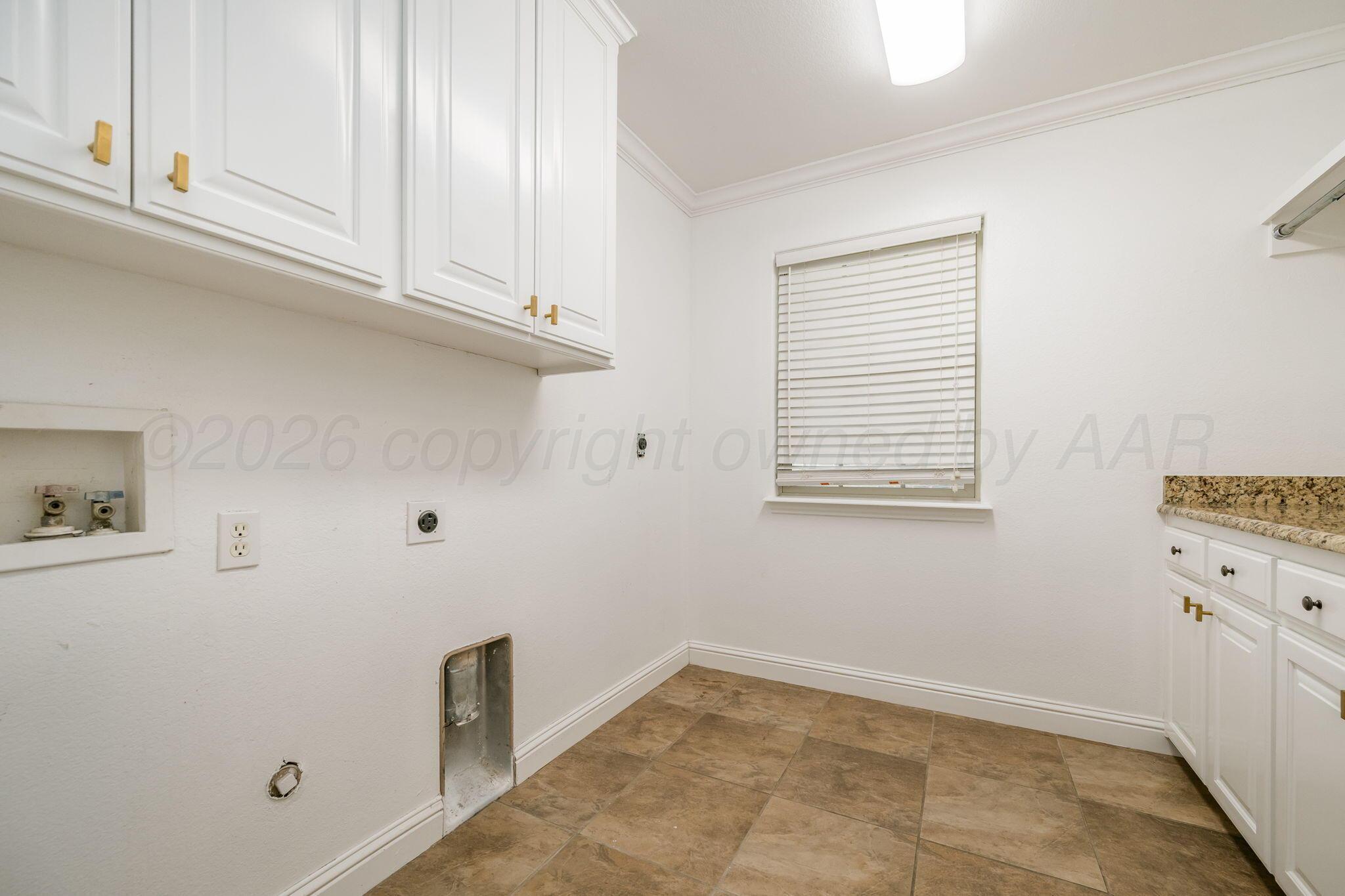16700 Dove Meadow Road Canyon, TX 79015 - Photo 17 of 24 a view of cabinets and window