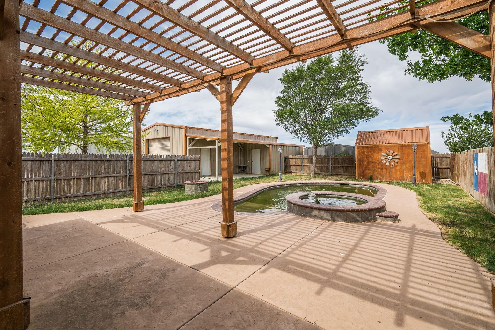 16700 Dove Meadow Road Canyon, TX 79015 - Photo 18 of 24 a view of swimming pool with a patio