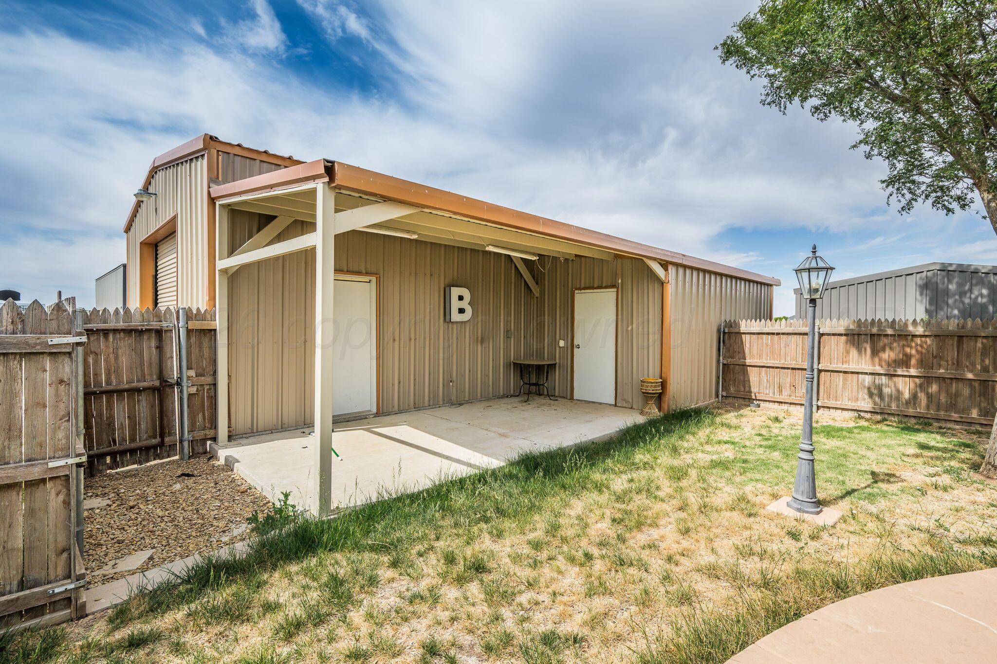 16700 Dove Meadow Road Canyon, TX 79015 - Photo 20 of 24 a backyard of a house