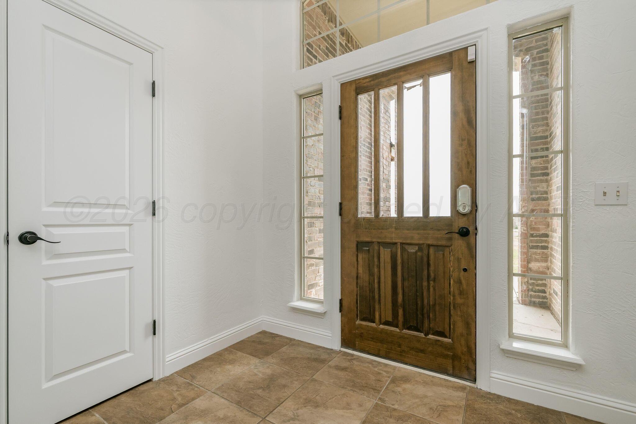 16700 Dove Meadow Road Canyon, TX 79015 - Photo 2 of 24 a view of a entryway door