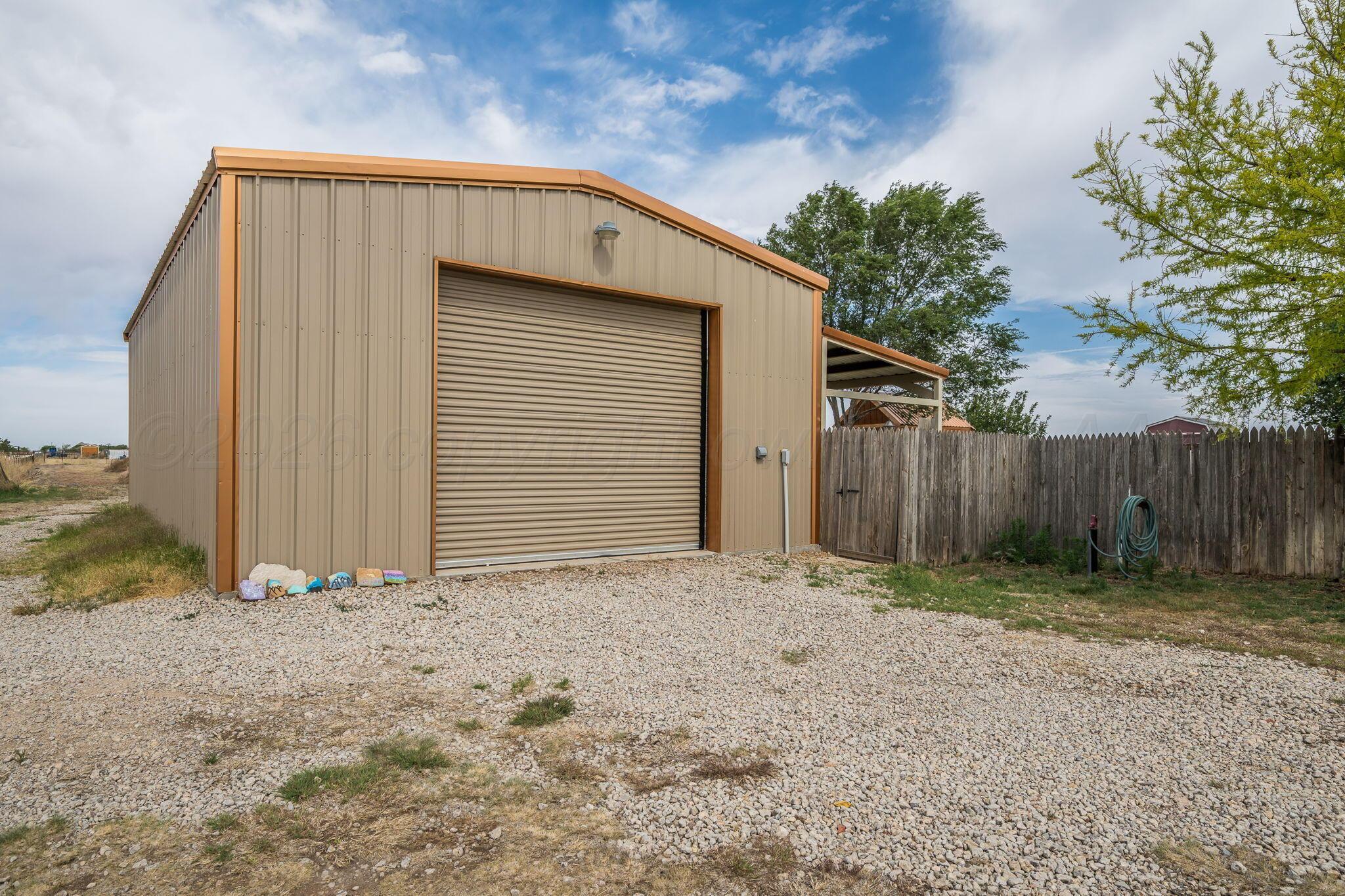 16700 Dove Meadow Road Canyon, TX 79015 - Photo 21 of 24 a backyard of a house