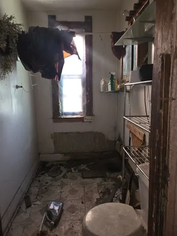 a living room with a furniture