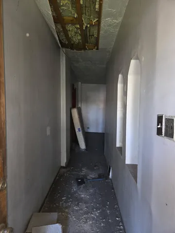 a view of a livingroom with a staircase