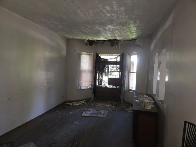 an empty room with windows