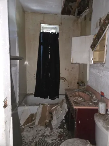 a view of livingroom and hardwood