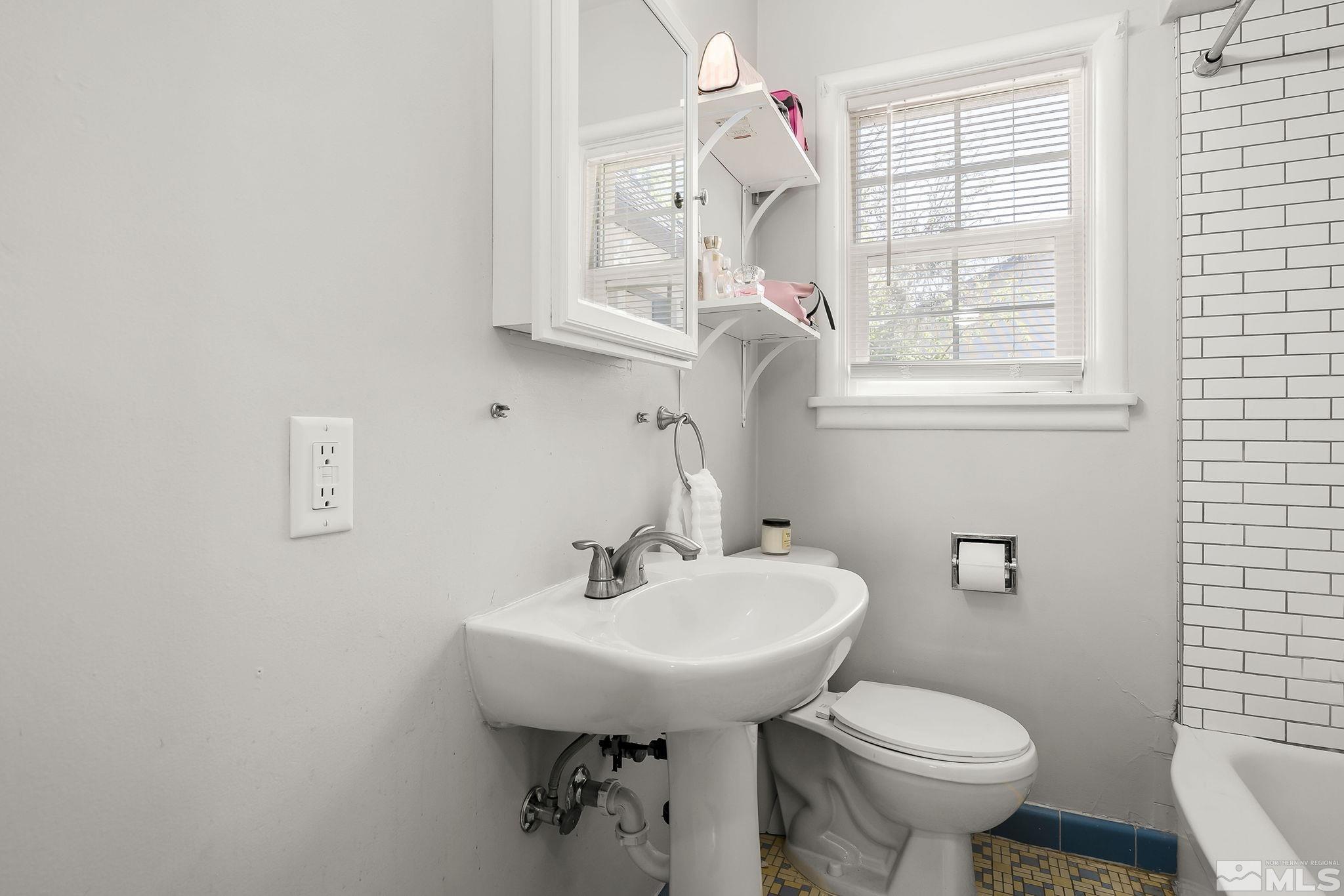 1124 Bon Rea Way Reno, NV 89503 - Photo 12 of 18 a bathroom with a sink and a toilet