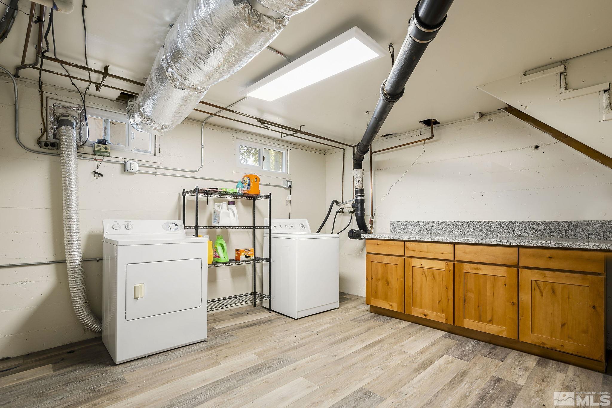 1124 Bon Rea Way Reno, NV 89503 - Photo 15 of 18 a view of a storage & utility room with wooden floor