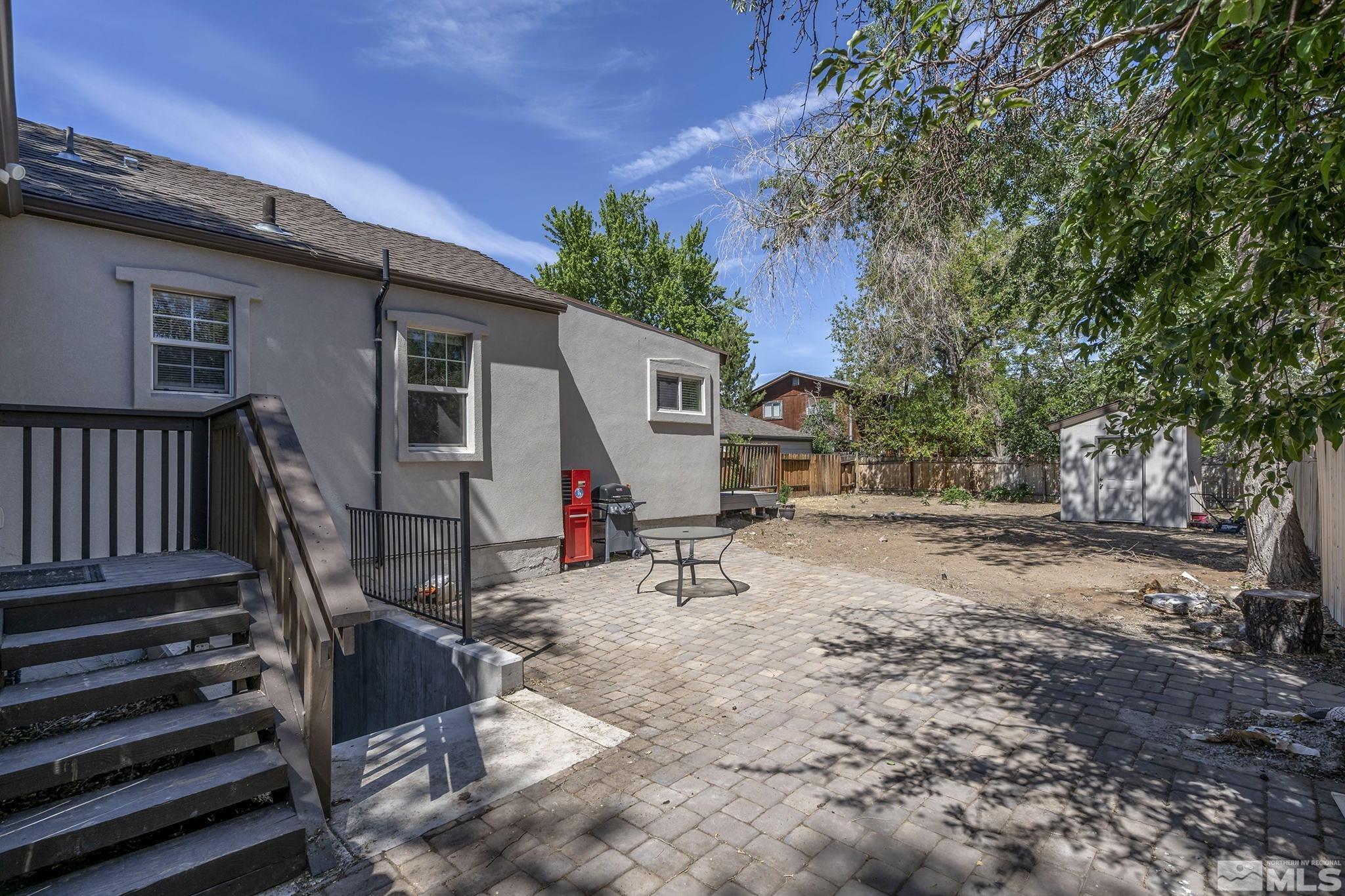1124 Bon Rea Way Reno, NV 89503 - Photo 17 of 18 a view of a house with backyard and a tree