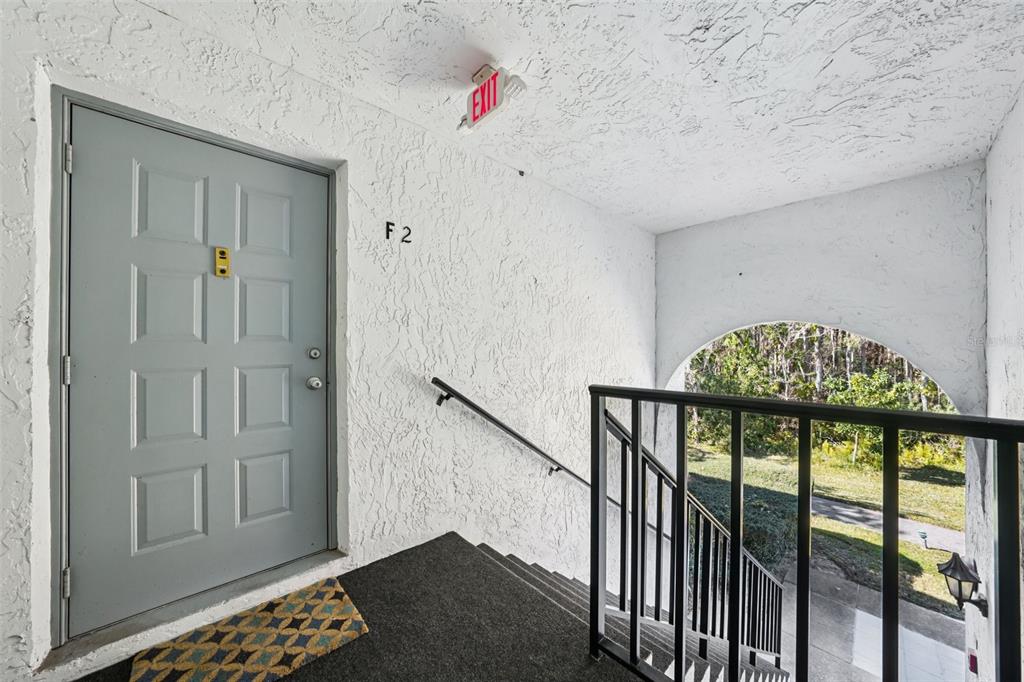 1290 Pine Ridge Circle East, Unit F2 Tarpon Springs, FL 34688 - Photo 2 of 65