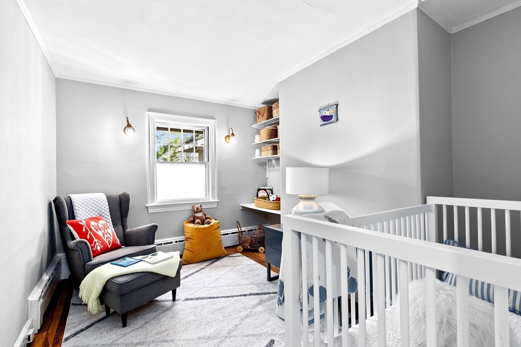 25 Duffield Road Newton, MA 02466 - Photo 11 of 19 a bedroom with furniture and a window